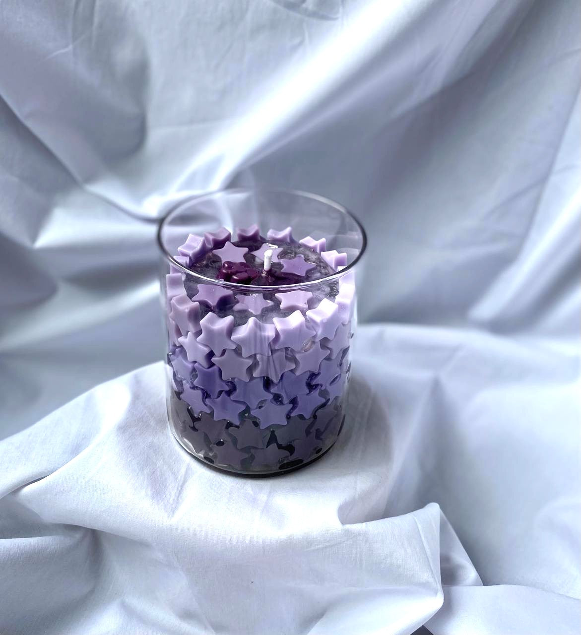 Vela en recipiente de vidrio